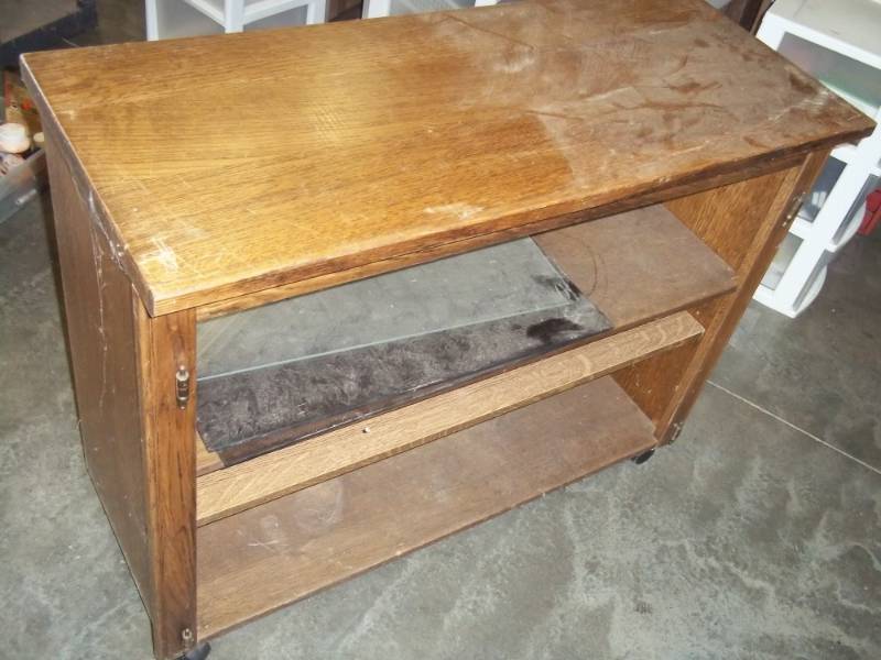 lot 238 image: Wood Cabinet 4 shelf 30x38x16 on wheels