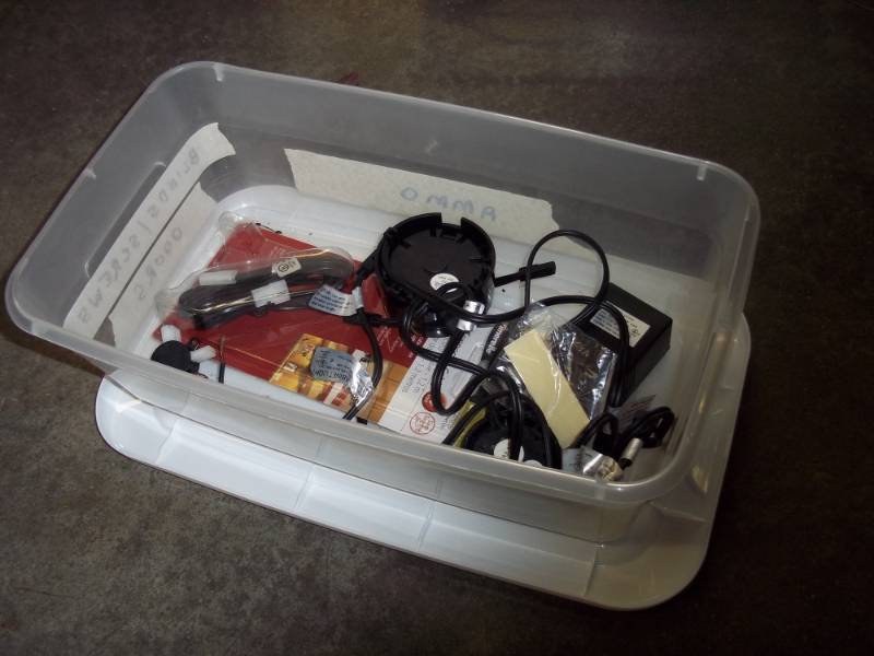 lot 244 image: Plastic Storage tote with supplies