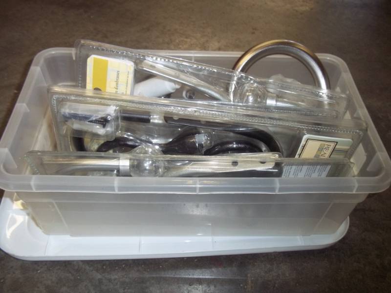 lot 248 image: Plastic Storage tote with supplies