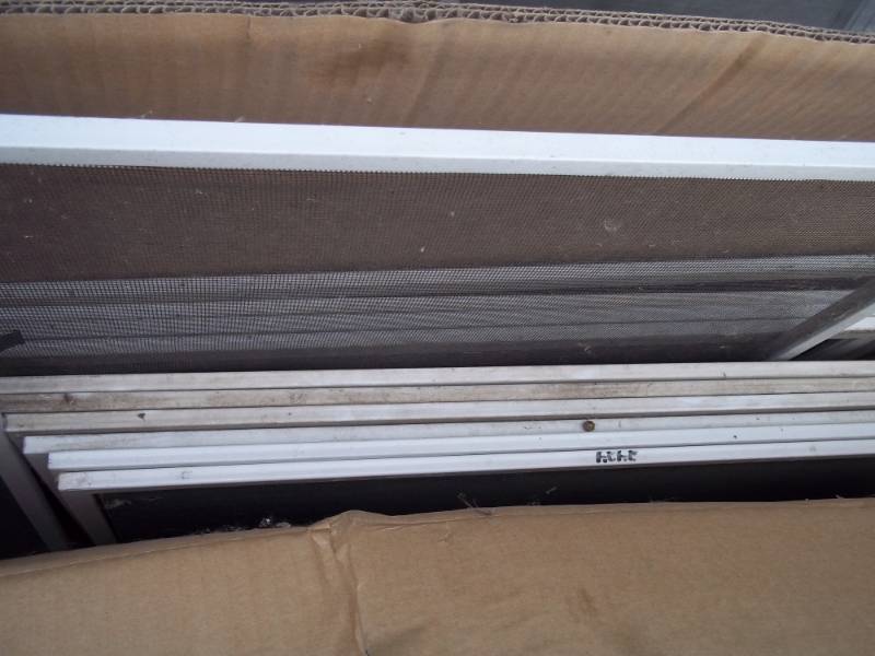 lot 353 image: Window screens & windows