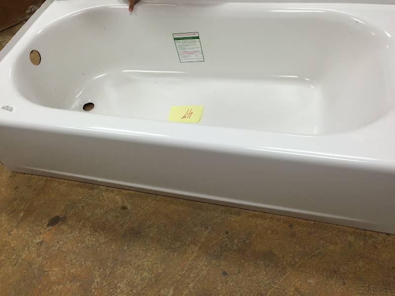 American Std Princeton 5 ft. Left Hand Drain Bathtub in White damage on a corner see pictures