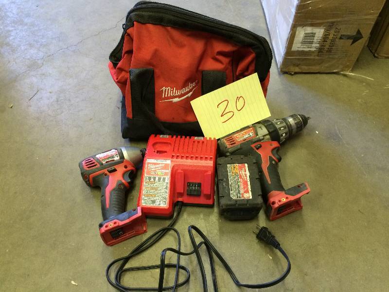 Set of Milwaukee Tool no battery but includes a chanrger  in working condition