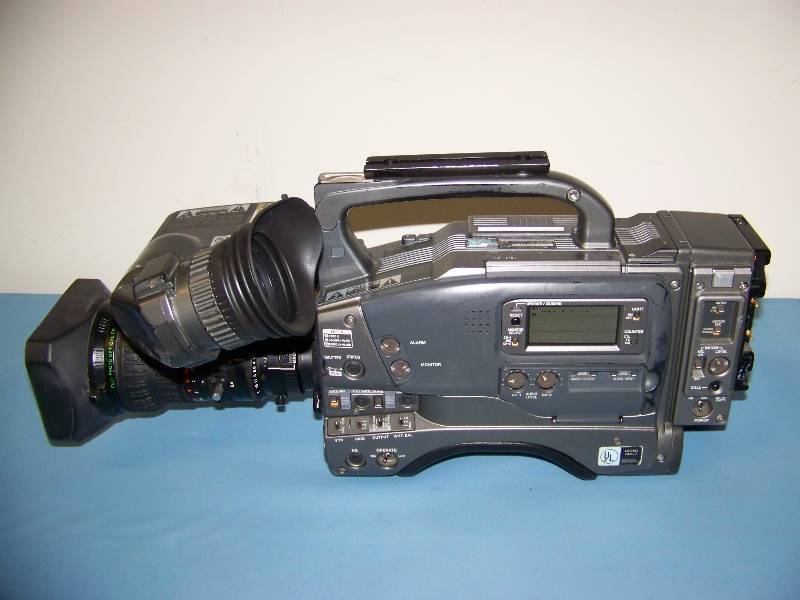 lot 53 image: (2) JVC, DV Camcorders, (1) Hand Held Camera Control Remote and View Finders