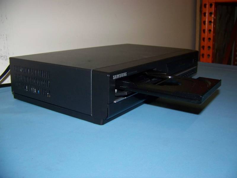 lot 46 image: Samsung, DVD  VCR Combo Player with Remote Control
