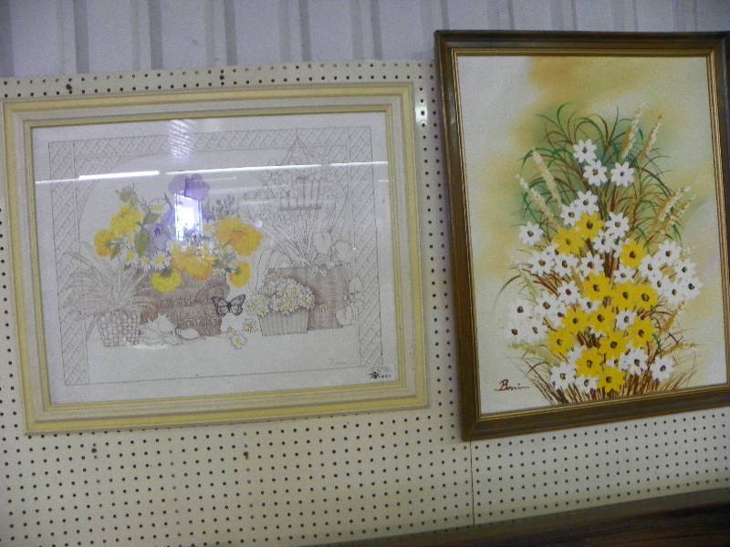 Two wall hangings featuring yellow flowers