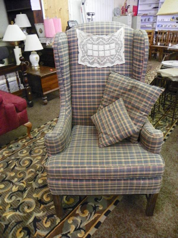 Deep green plaid wing back chair
