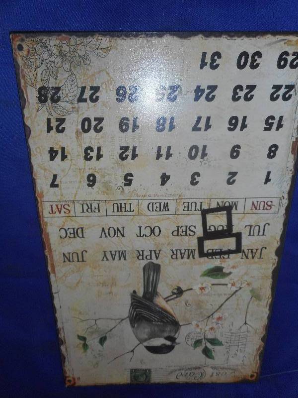 VINTAGE METAL CALENDER