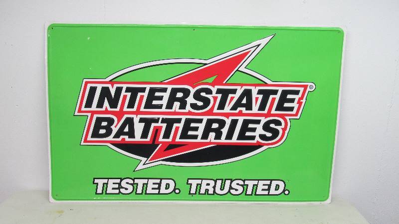 lot 36 image: Large Interstate Batteries Embossed Metal Sign