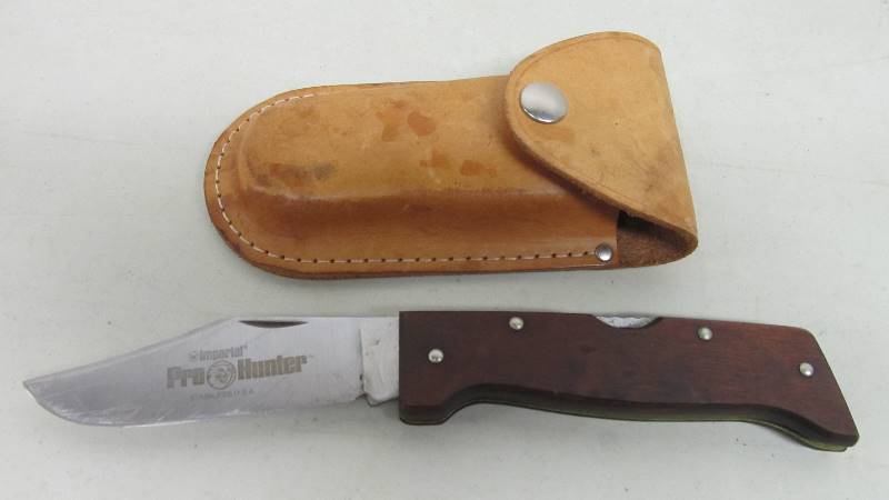 lot 48 image: Imperial Folding Hunting Knife in Leather Case.