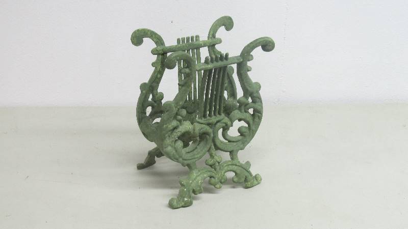 lot 62 image: Vintage Green Painted Metal Sculptural Magazine Rack