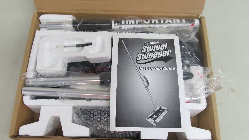 lot 71 image: New In Box Swivel Sweeper