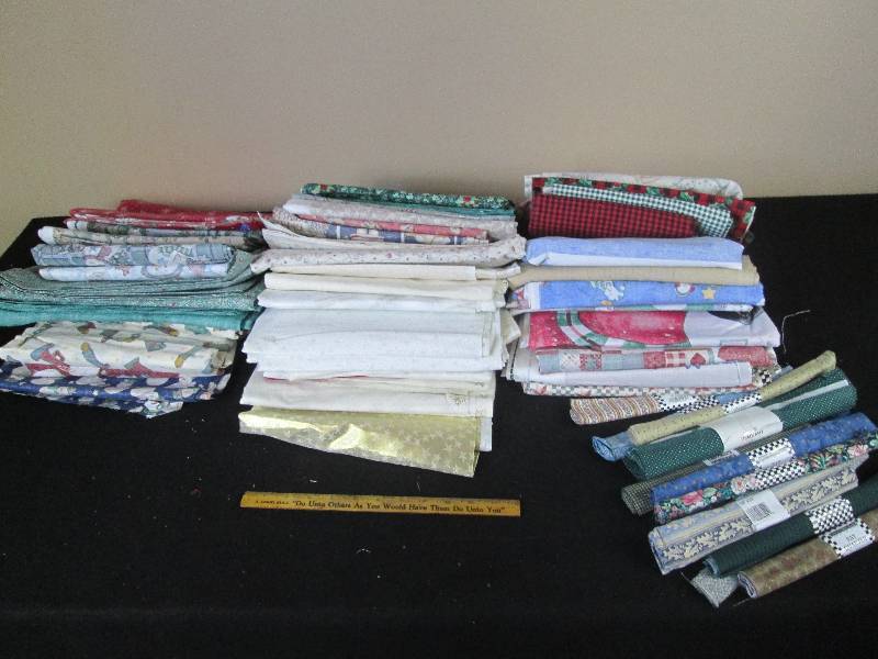 lot 21 image: Tote Full of Quilting Fabric