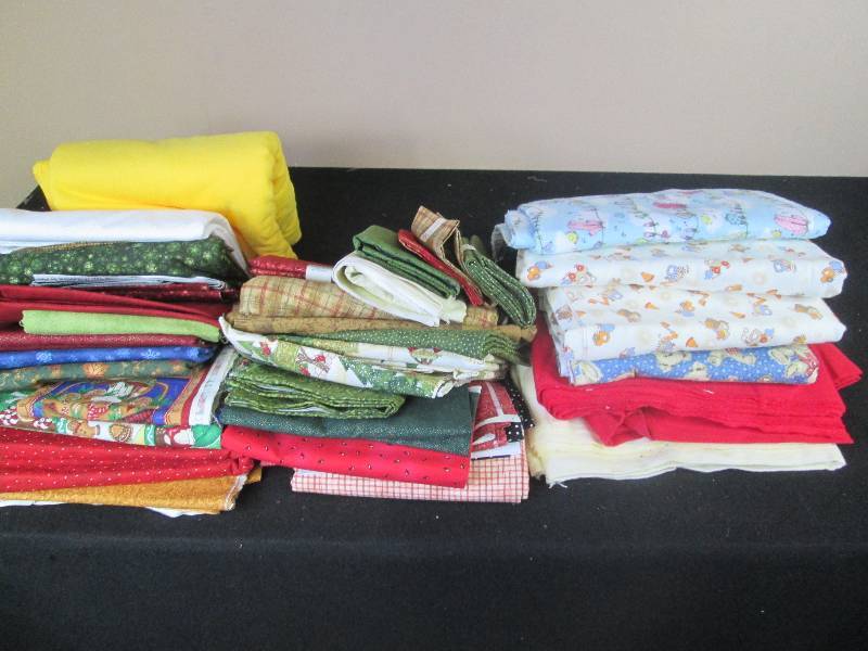 lot 23 image: Tote Full of Quilting Fabric