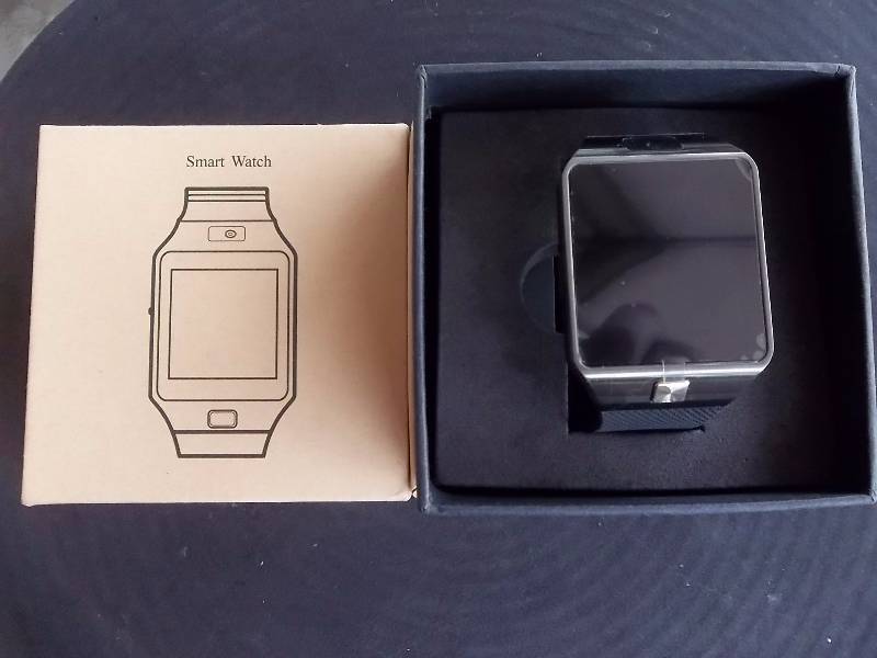 1-Smart Watch Phone, New In Box, With Manual & Charge Cord