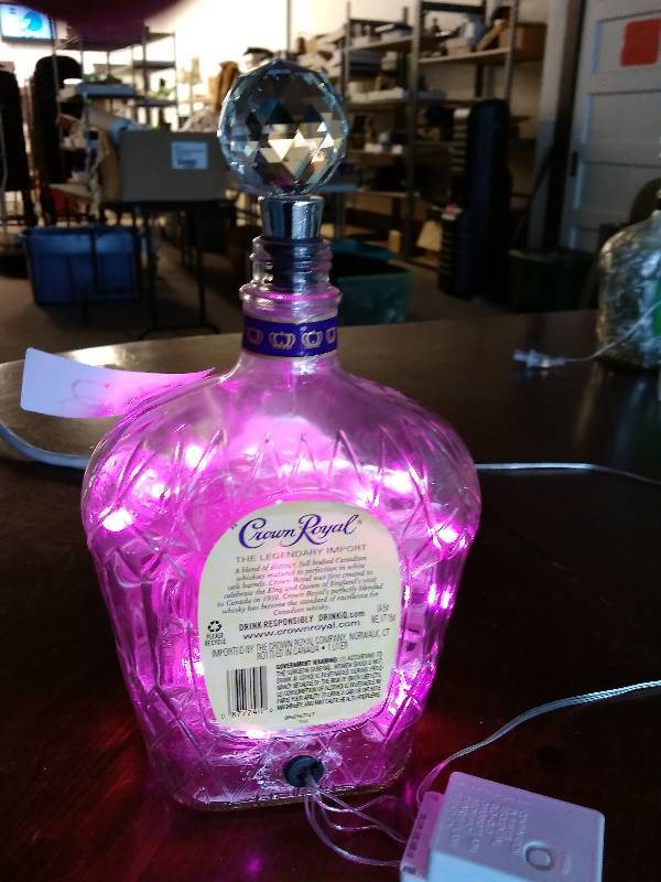 lot 32 image: Crown Royal Lighted Bottle with Glass Stopper