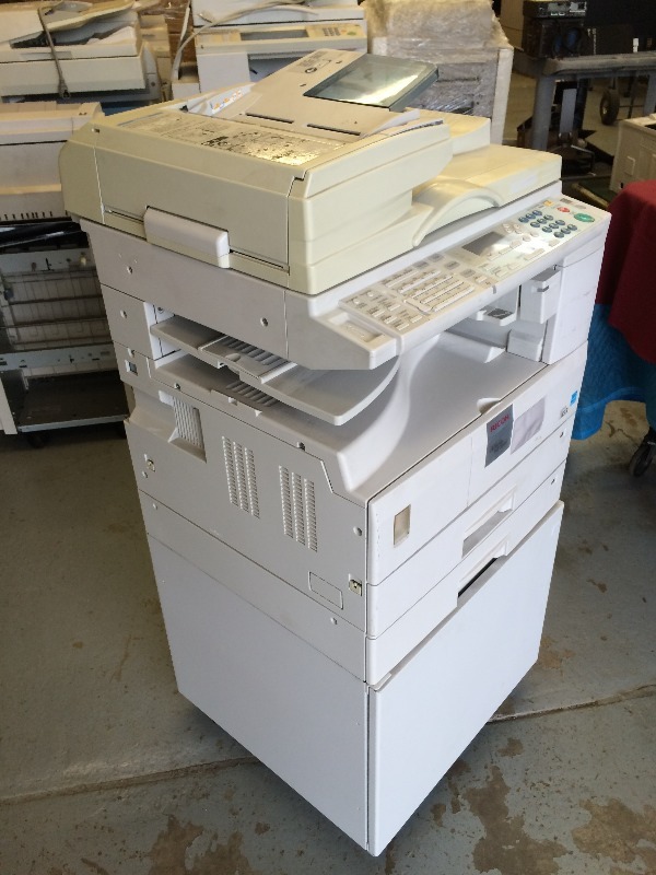 Ricoh AFICIO MP2000 Copy, print, scan and fax  View all pictures for more details   Bring you help to load