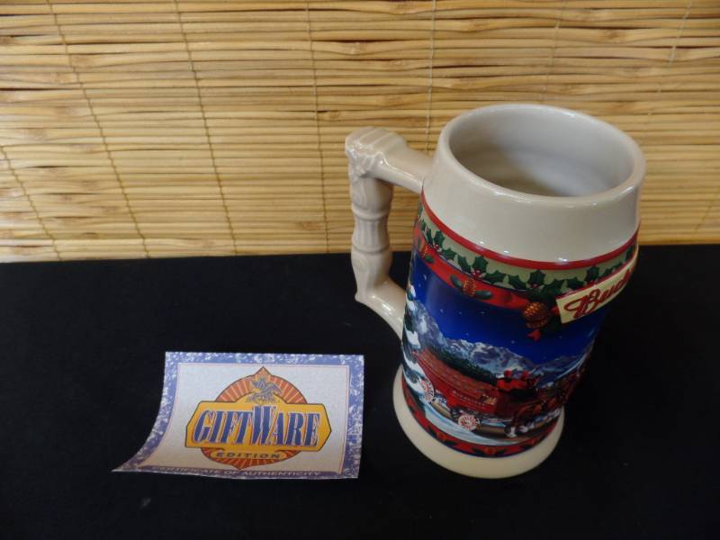 lot 23 image: Budweiser Christmas Steins