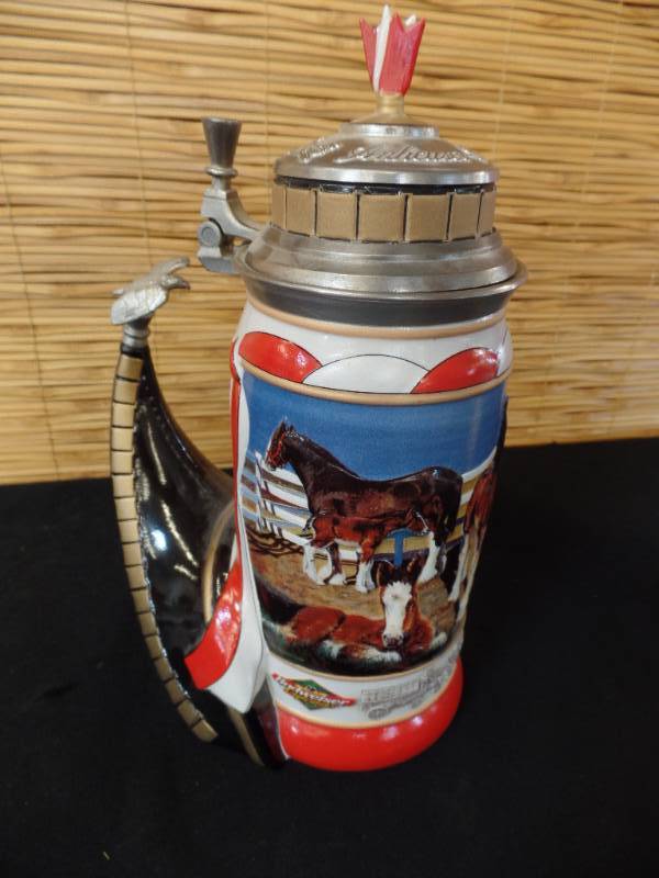 lot 31 image: Budweiser Steins