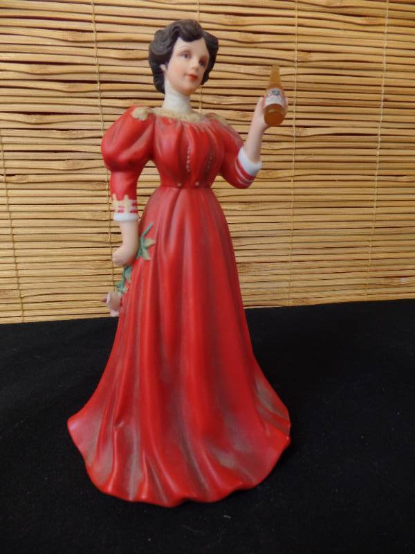 lot 63 image: Bud Girl Figurine