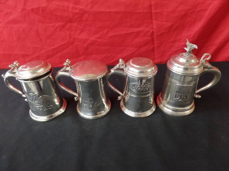lot 225 image: Silver Logo Steins