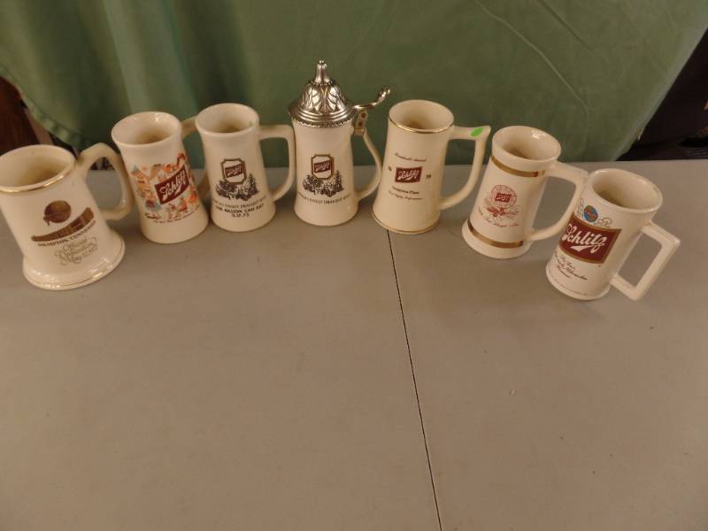 lot 267 image: Schlitz McCoy Pottery Steins