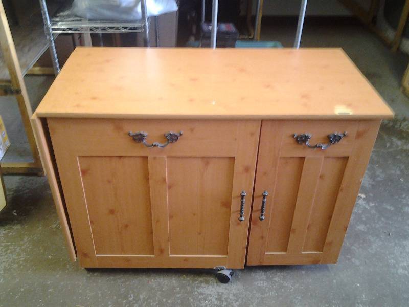 lot 4 image: Sewing Cabinet On Wheels 40x19x29