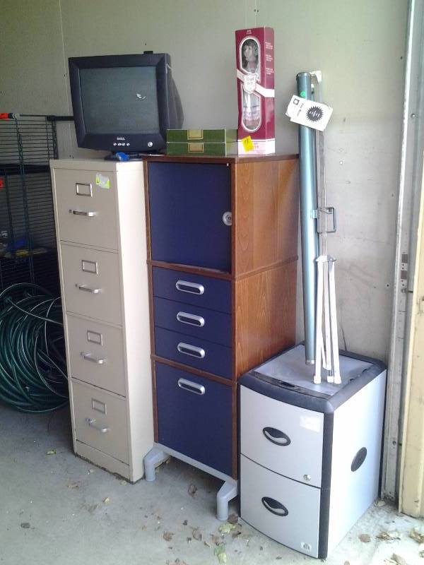 lot 101 image: 4 Drawer File, Dell Monitor, 4 Drawer Organizer, 2-Drawer File, Projection Screen, Doll, Avon Plates