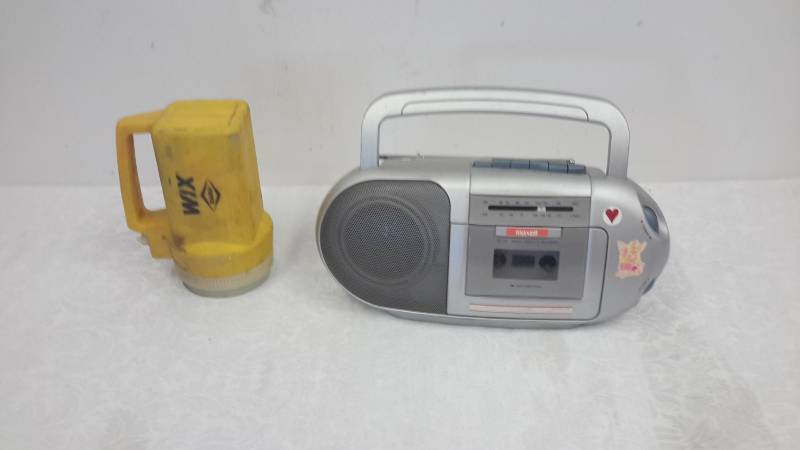 Battery operated radio and flashlight