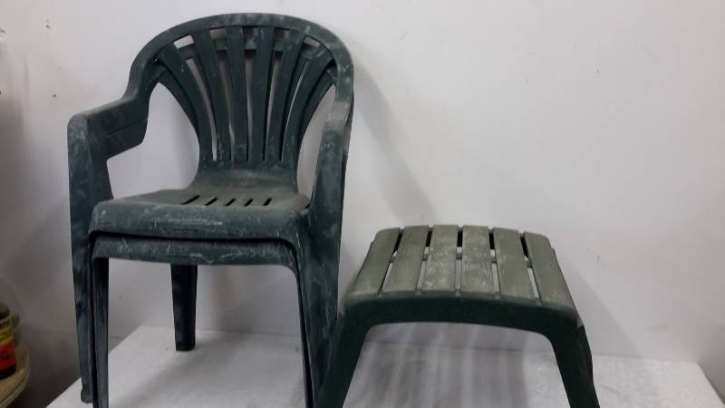 Two outdoor chairs and one table