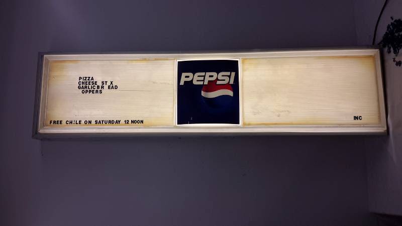 Lighted Pepsi menu sign