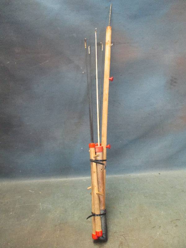 lot 70 image: Wooden Ice Fishing Poles