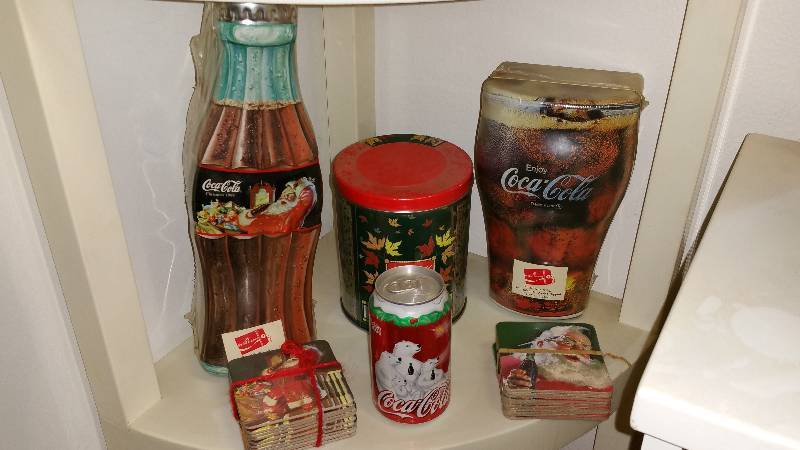 lot 16 image: Unopened Coca-Cola Snack Tins, Coasters, Etc.