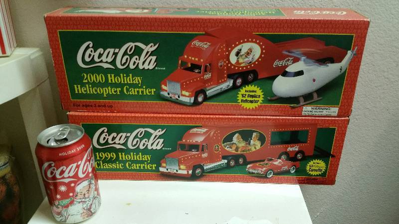 lot 17 image: 1999 & 2000 Holiday Helicopter & Corvette Carriers NEW IN BOX