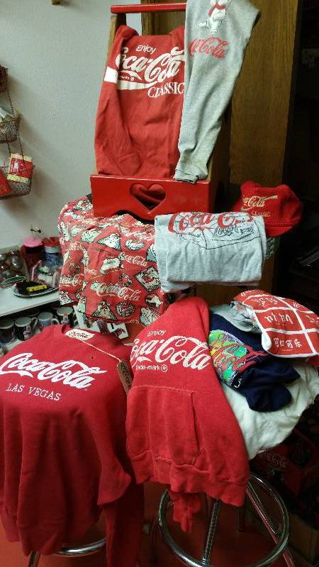 lot 58 image: Large Lot of Coca-Cola Shirts, Hoodies, Etc.