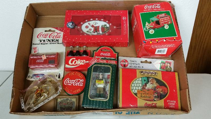 lot 64 image: Coca-Cola Key Chains, Musical Magnet, Etc.