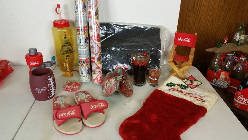 lot 76 image: Coca-Cola Wrapping Paper, Ornament, Stocking, Candles, More