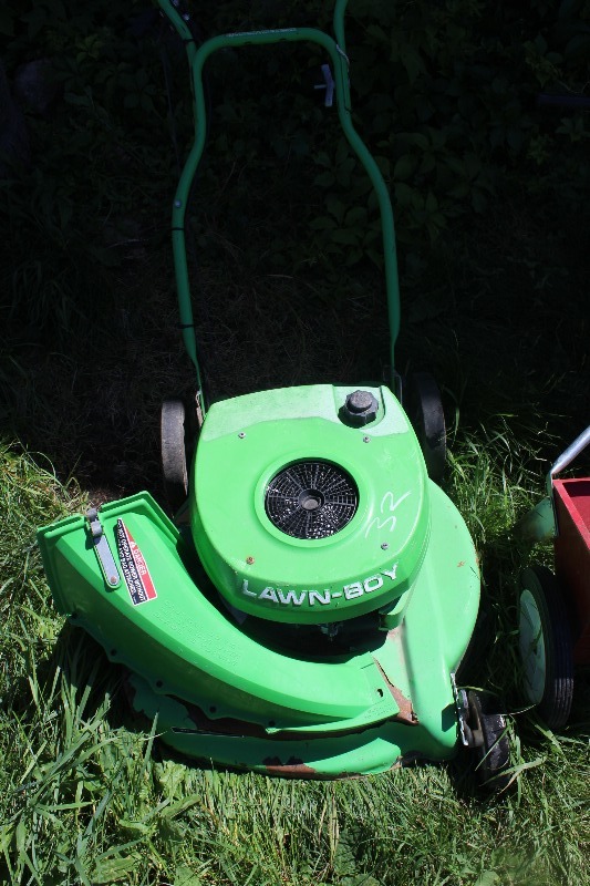 lot 8 image: 2 Push Mowers and a Seed Spreader