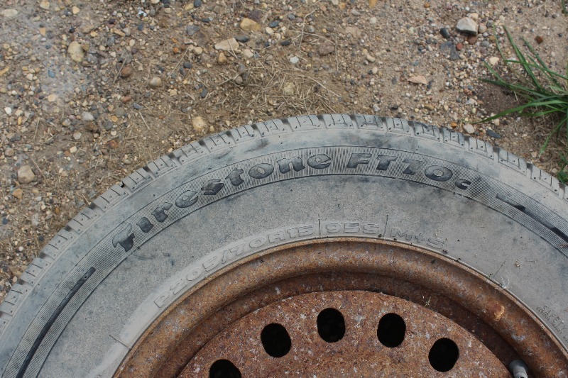 lot 10 image: Single P20570R15 Tire on Wheel