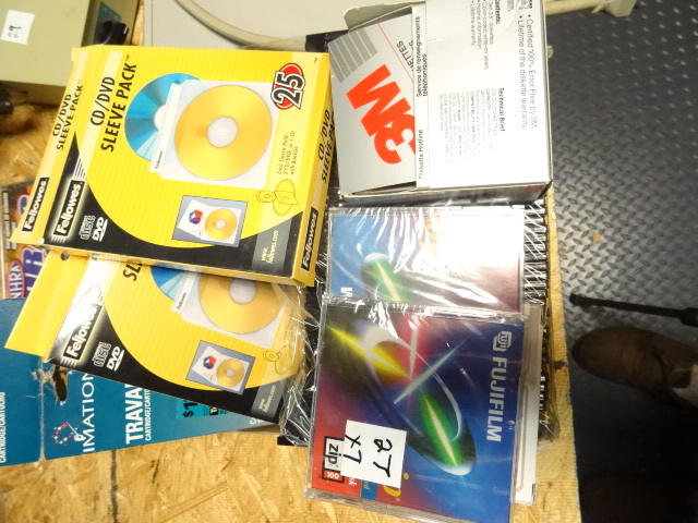 lot 27 image: Misc. Media 4 Zip disks-1 TRAVAN-3 Cartridge 3.2GB, 4Tapes, 10 3.5 Floppys, 50 CDDVD Sleeves, Slim Jewel Cases