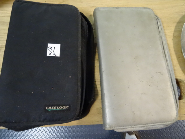 lot 81 image: 2 CDDVD Folders. 1 Case Logic 1 generic