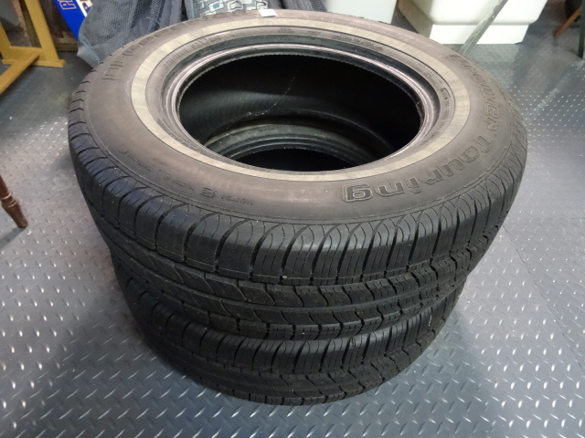 lot 112 image: 2 tires BF Goodrich Premier Touring  (P21570R15)  Like New