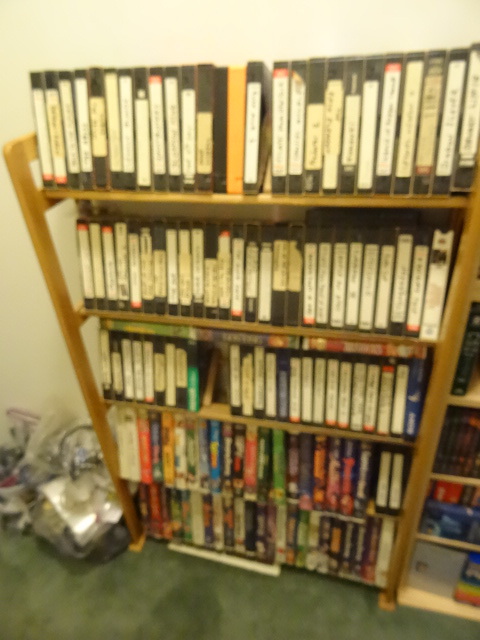 lot 113 image: Media Rack wvhs tapes (Some Disney)