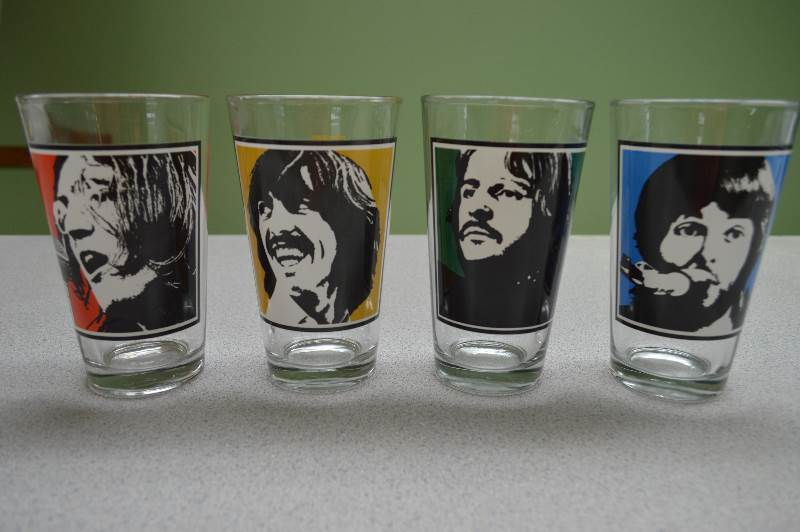 lot 10 image: 4-Beatles theme drinking glasses