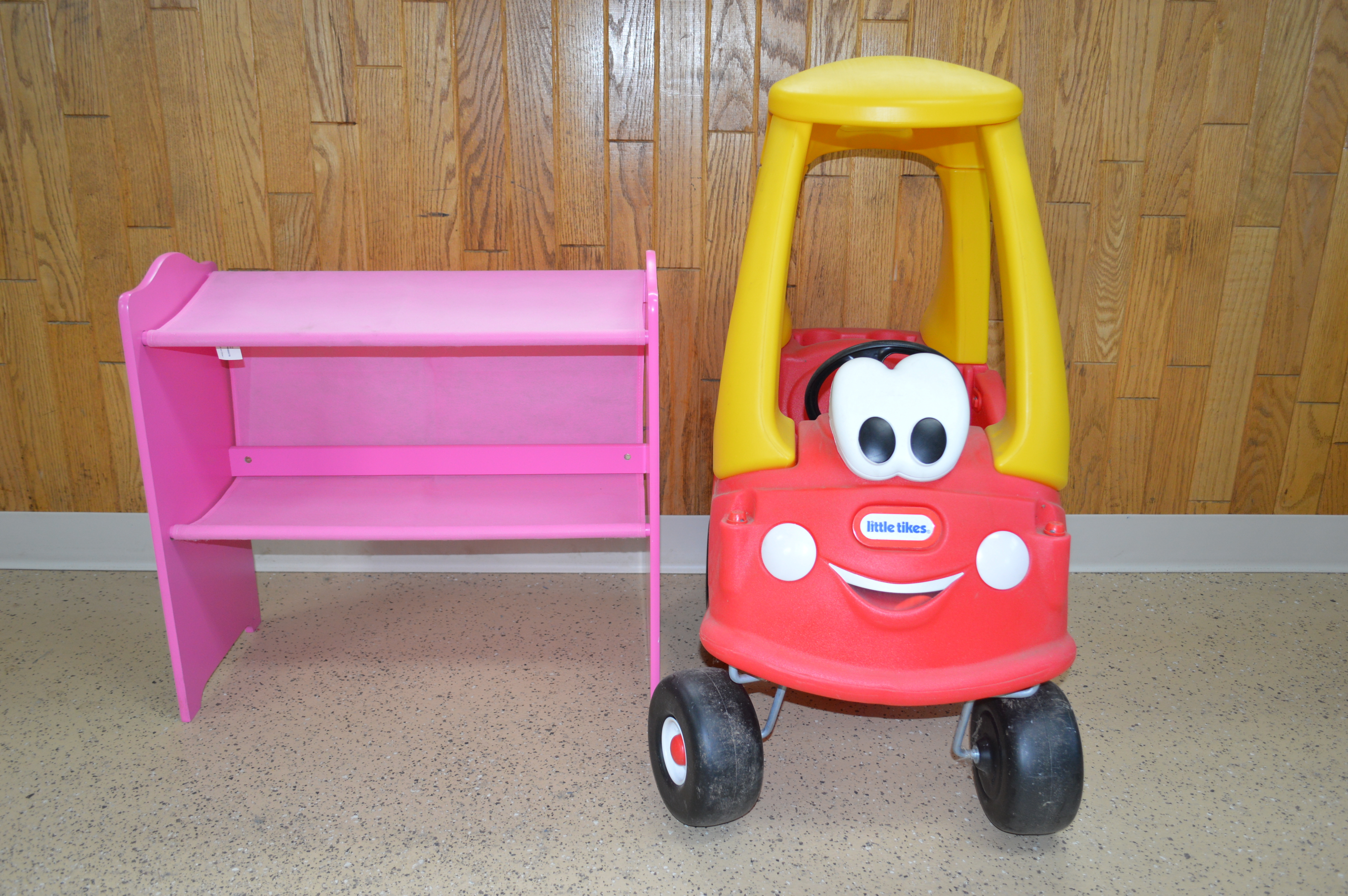 lot 27 image: Little tikes plastic car and Dora shelf.