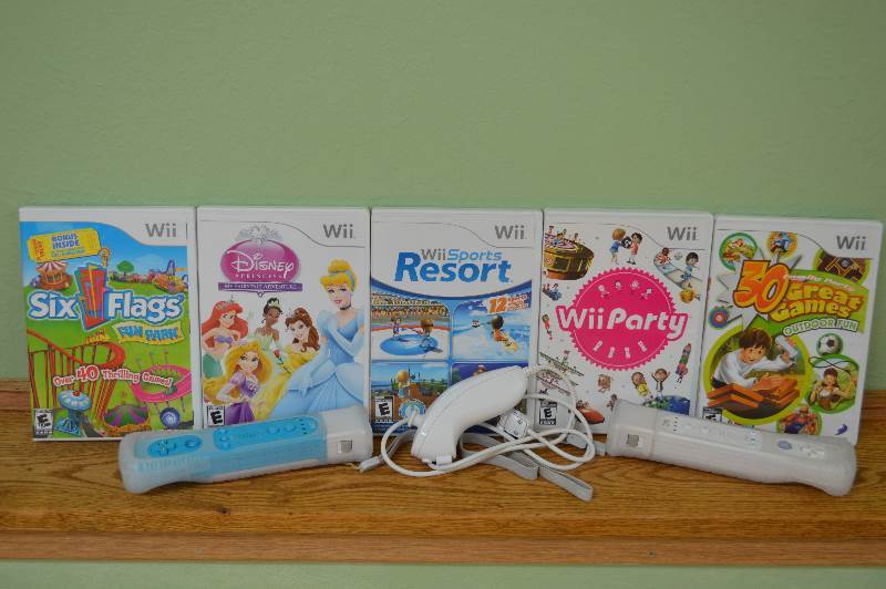 lot 71 image: Wii games and spare remotes