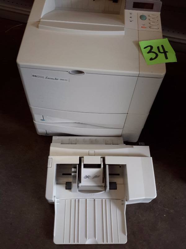 lot 34 image: HP Laser Jet 4000 TN printer and card feeder attachment