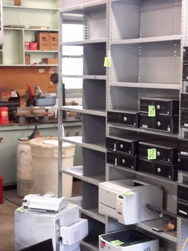 lot 131 image: 2, Metal Shelving units.. 36in x 12in x 87 in h..  1 Has sides and back 1 is missing one side.