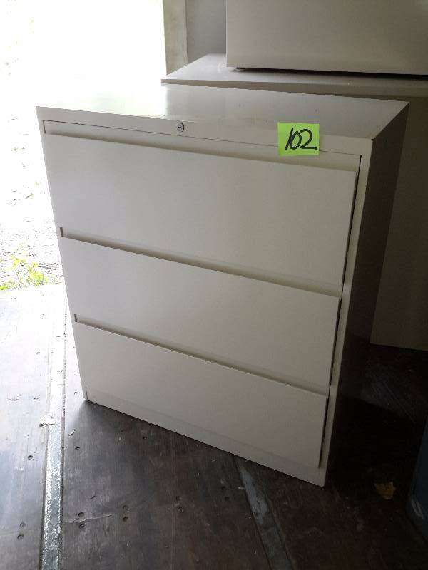 lot 102 image: 3 drawer lateral File Cabinet.. Nice shape. .