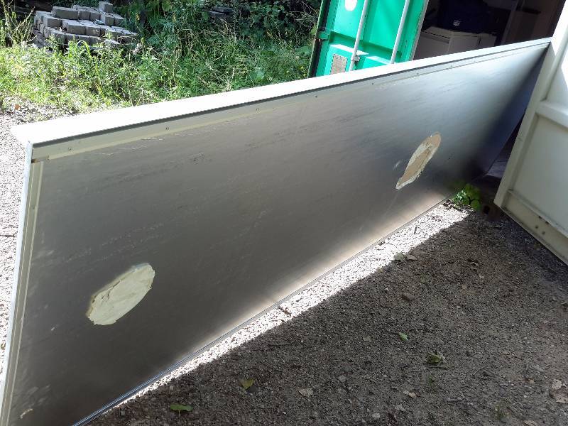 lot 13 image: Large Blackboard, 14 ft x 49 in.. Have Aluminum Frame has cork strip along top for hanging items.