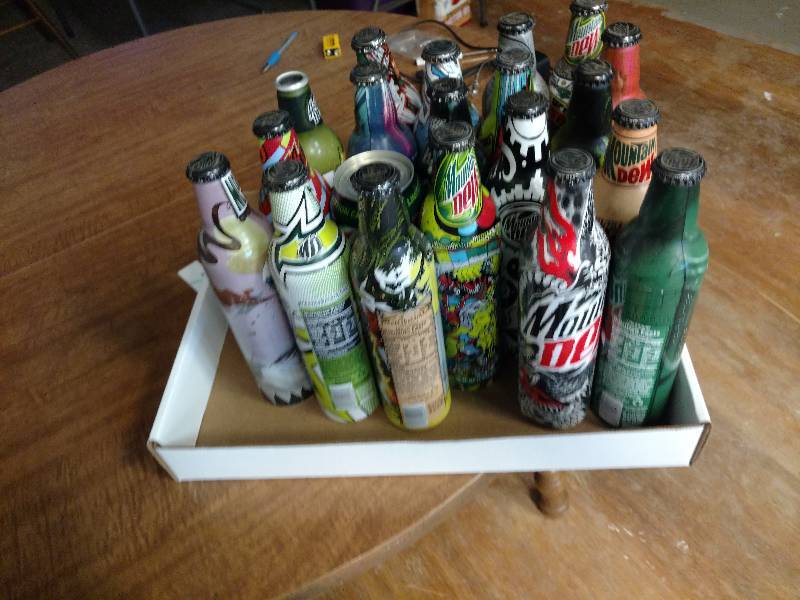 lot 63 image: Mountain Dew Collector Can Lot